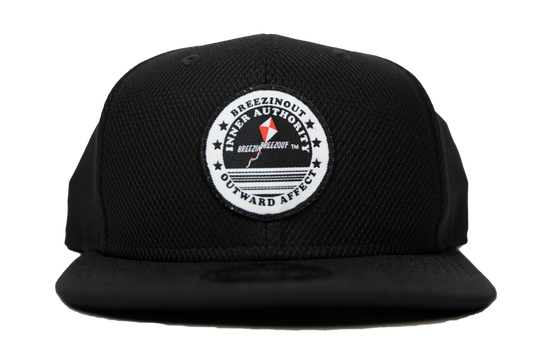 Black snap back baseball cap with IAOA seal center front