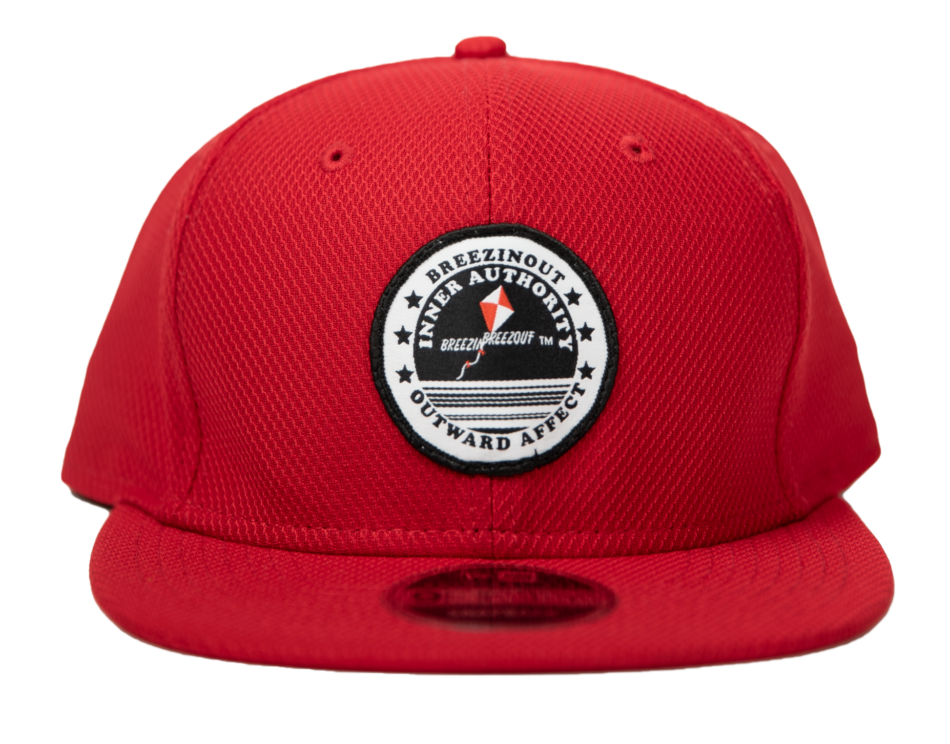 Red snap back baseball cap with IAOA seal center front